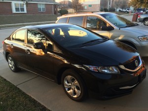 Our newer vehicle, 2013 Honda Civic, next to the old faithful van. We now have reliable transportation again!